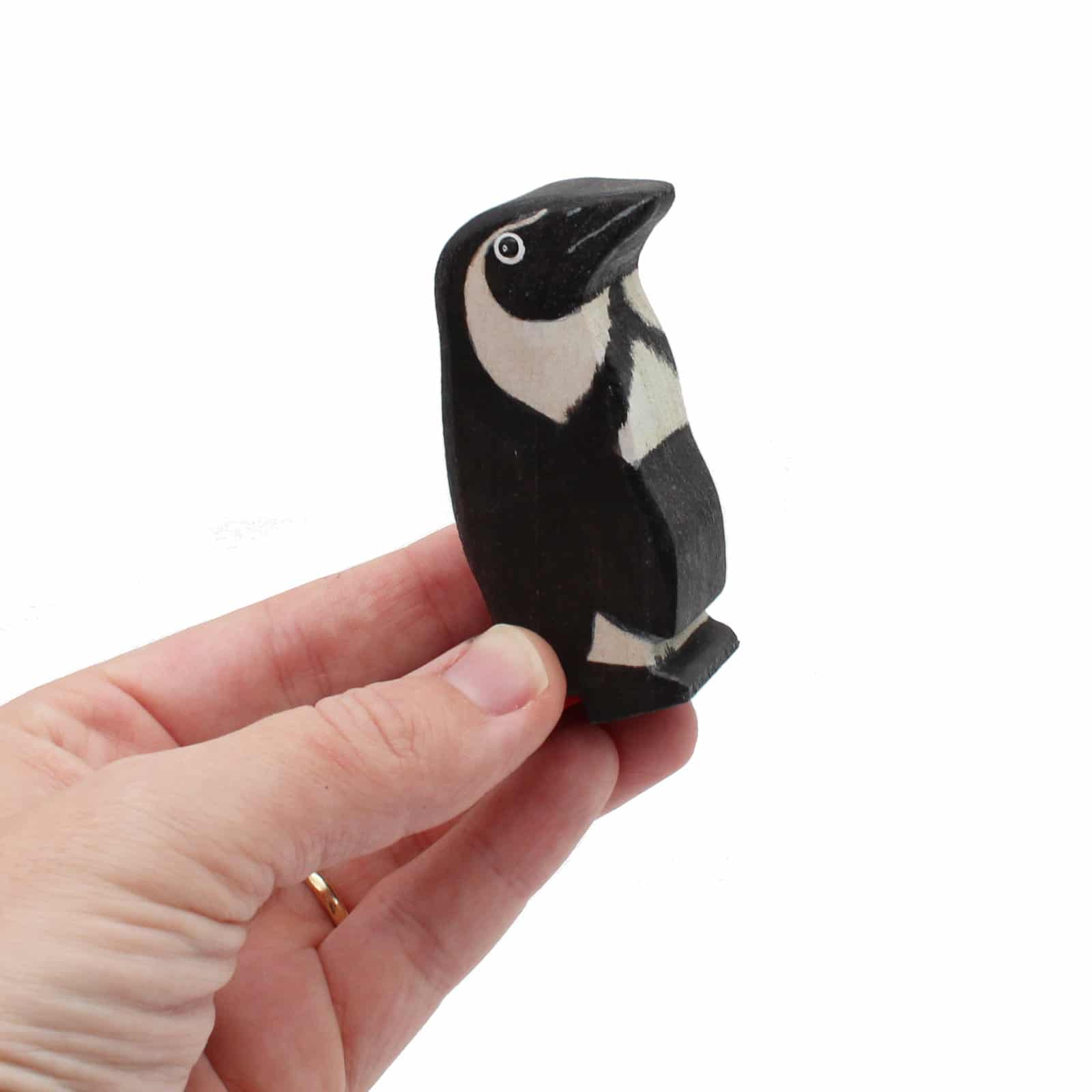 African Penguin in Hand Wooden Bird