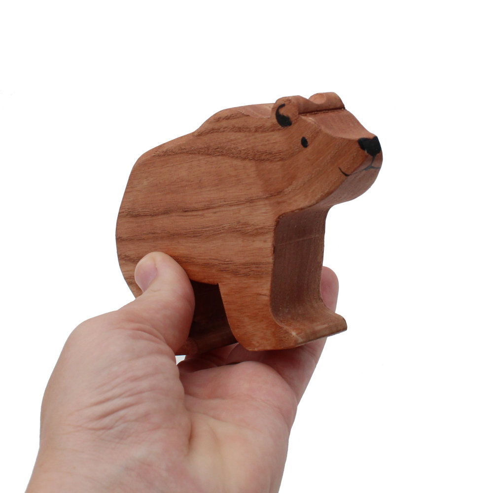 Brown Bear Wooden Figure In Hand