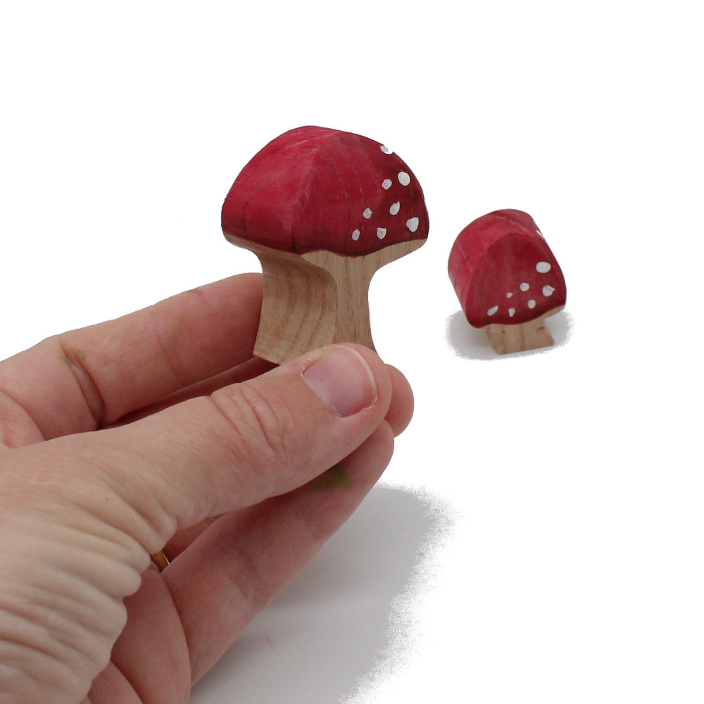Mushrooms Wooden Figures in hand