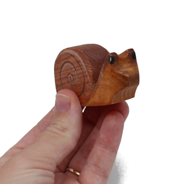 Snail In Hand Wooden Figure
