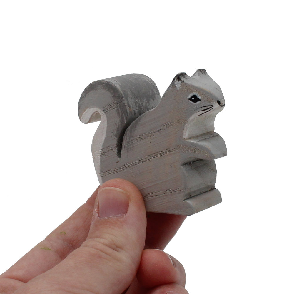 Squirrel Sitting Wooden Figure in hand